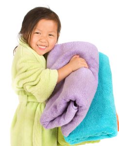 View clothing accessories Girl in bathrobe with towels