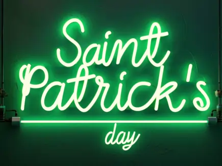 Green neon sign that says St. Patricks Day in cursive writing