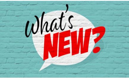 Whats New text on a turquoise painted wall